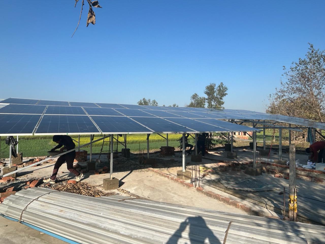 Bright Solar Solutions team installing solar panels
